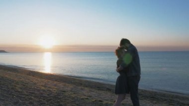 Sunset Beach sırasında seven Çift