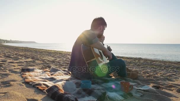Young man Playing Guitar Royalty Free Stock Footage