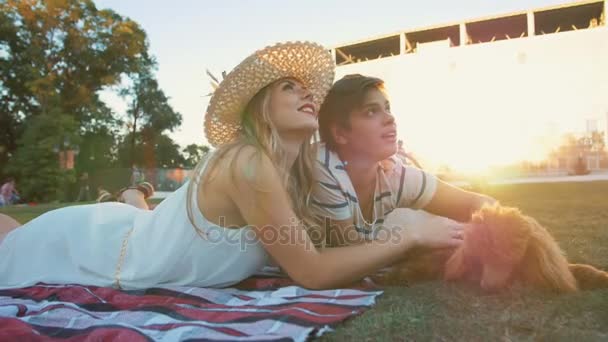 Couple On Picnic Resting With Dog — Stock Video