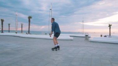 adam ile dört tekerlekli paten