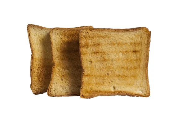 Três pão rusk isolado em um fundo branco. Delicioso pão torrado dourado torrado — Fotografia de Stock