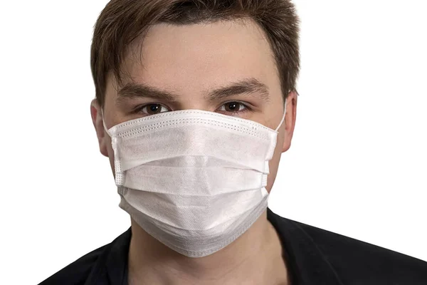 Corona Virus Jongeman Met Een Masker Een Witte Achtergrond Bescherming — Stockfoto