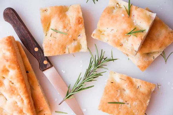 Simple plane pizza with rosemary and salt