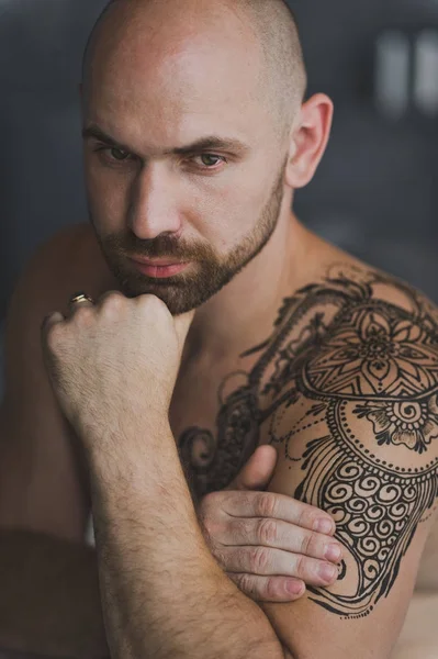 Close-up portrait of a bald brutal man with a beard 36. — Stock Photo, Image