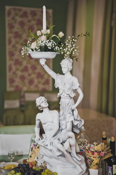 Table with statues made from plaster 7806. — Stock Photo, Image