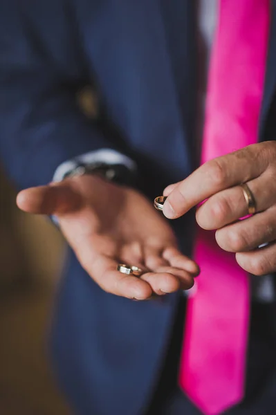 Mens hands with gold ornaments 1983. — Stock Photo, Image