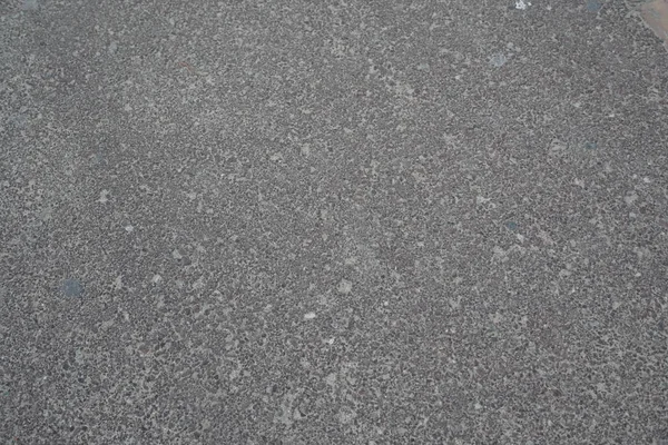 灰色のセメントの砂利の質感。抽象的な背景、砂利の質感や砂利の背景。グランド上の建設のために粉砕マカダム、ロックグレーの花崗岩の砂利. — ストック写真