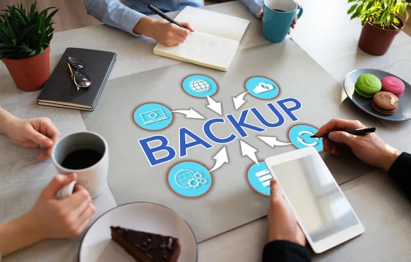 Backup user data security recovery internet technology concept on office desktop.