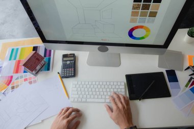 Mühendisler ve yaratıcı sanatçılar masa, iş, danışma, renk ve malzeme seçimi, ölçüm boyutu, serin renkler, yumuşak tonlar ve güzel tonlarda çalışırlar..