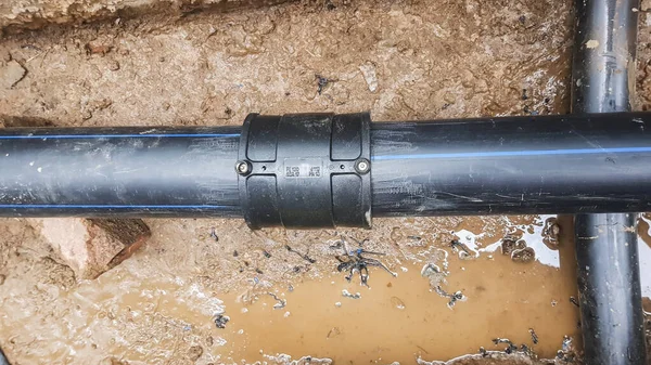 Breakthrough city hot water system. Repair and replacement of steel pipes. Earthwork.
