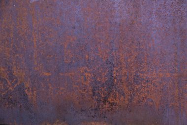 Paslı çelik levha, kırmızı tonda.
