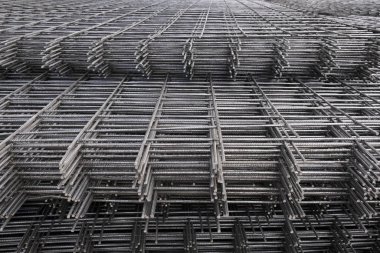 Demir çubuk, güçlendirme çubuğu ya da çeliği yakın çekim, güçlendirme çeliği güçlendirme, güçlendirilmiş beton için gerilim aracı olarak kullanılan çelik örgüler..