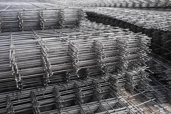 Rebar, reinforcing bars or steel close up, reinforcement steel, wires mesh of steel used as a tension device in reinforced concrete. — Stock Photo, Image