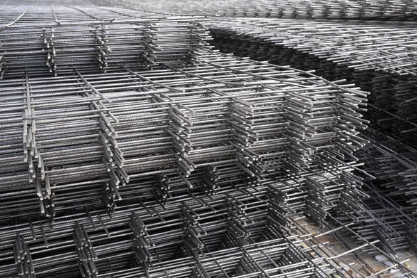 Rebar, reinforcing bars or steel close up, reinforcement steel, wires mesh of steel used as a tension device in reinforced concrete.