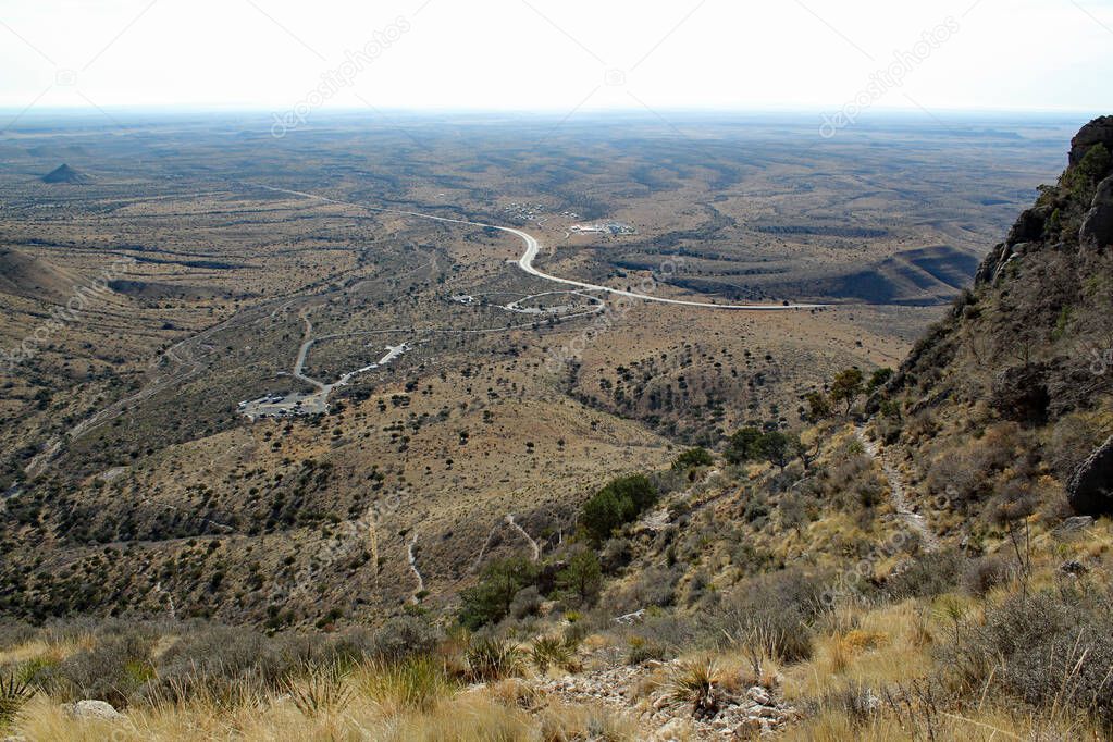 View into Texas Landscape: Barren and empty desert landscape / View from Guadalupe Peak / Guadalupe Mountains Nationalpark Campground