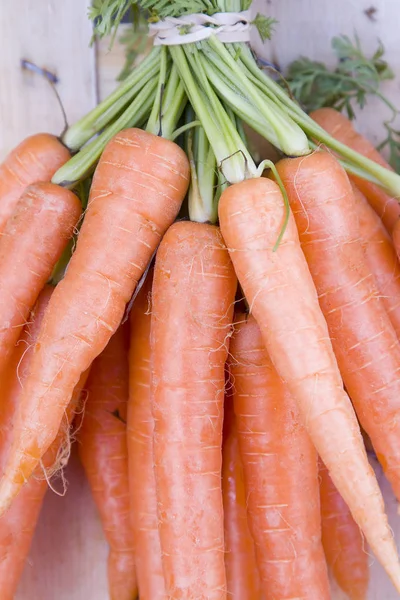 Some carrots in a market — Stock Photo, Image