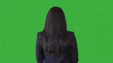 yeşil arka plan üzerinde siyah iş kadını