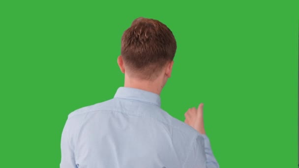 Man talking against green background — Stock Video