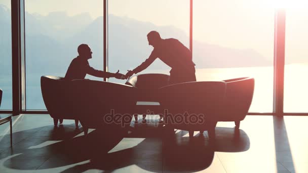 Two business partners exchanging greetings — Stock Video
