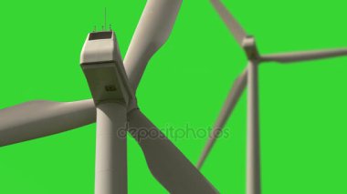 yeşil arka plan üzerinde dönüm Rüzgar türbinleri