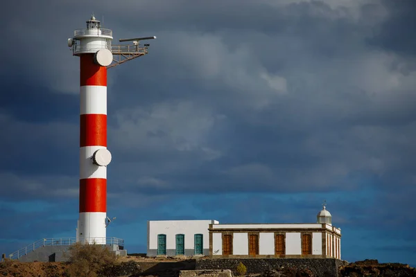 Punta Abona lighthouse. Landscape overlooking the ocean. Sunset. The water is shiny. Tenerife Island, Spain — Stock Photo, Image