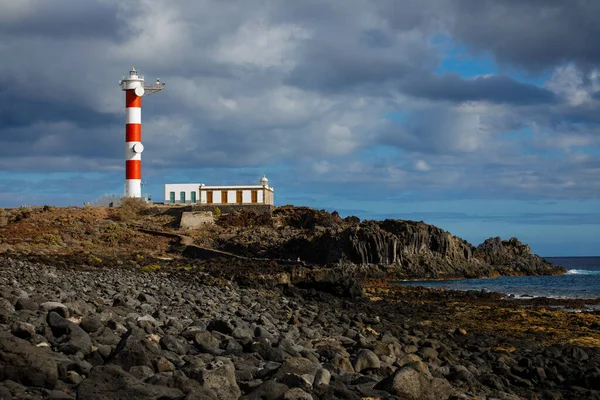 Punta Abona lighthouse. Landscape overlooking the ocean. Sunset. The water is shiny. Tenerife Island, Spain — Stock Photo, Image