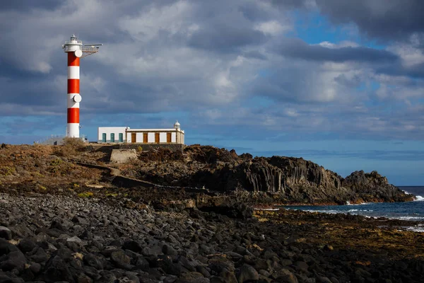 Punta Abona lighthouse. Landscape overlooking the ocean. Sunset. The water is shiny. Tenerife Island, Spain — Stock Photo, Image