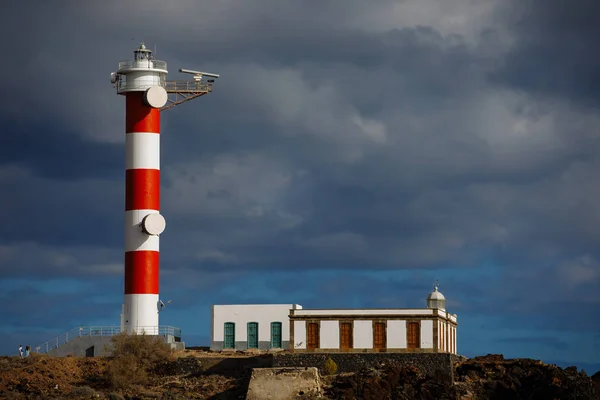 Punta Abona lighthouse. Landscape overlooking the ocean. Sunset. The water is shiny. Tenerife Island, Spain — Stock Photo, Image