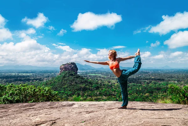 Young woman meditation on the mountain Pidurangala Rock, Sri Lanka. Sigiriya — Stock Photo, Image