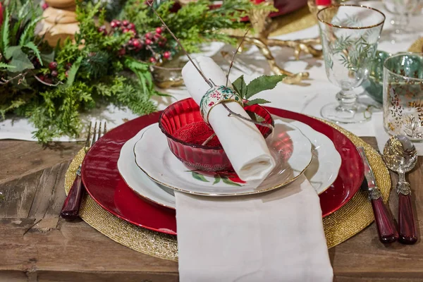 Christmas dinner with glasses and ornaments — Stock Photo, Image