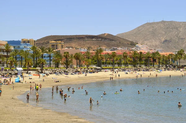 Playa De Las Americas beach tourists on the beach enjoying the s — Stock Photo, Image