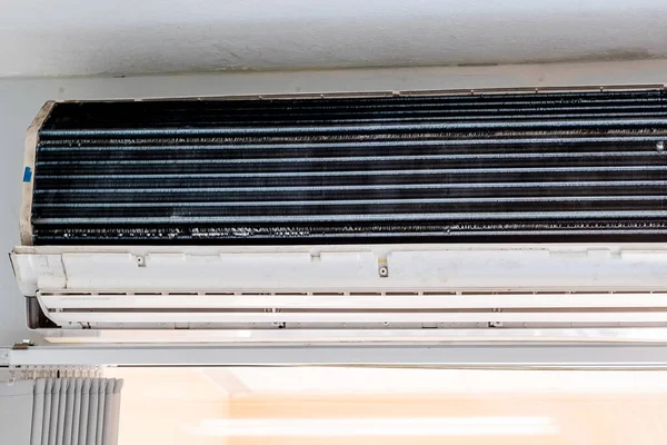 Air conditioner during Maintenance indoor. Cleaning, Washing and Conditioning Service concept