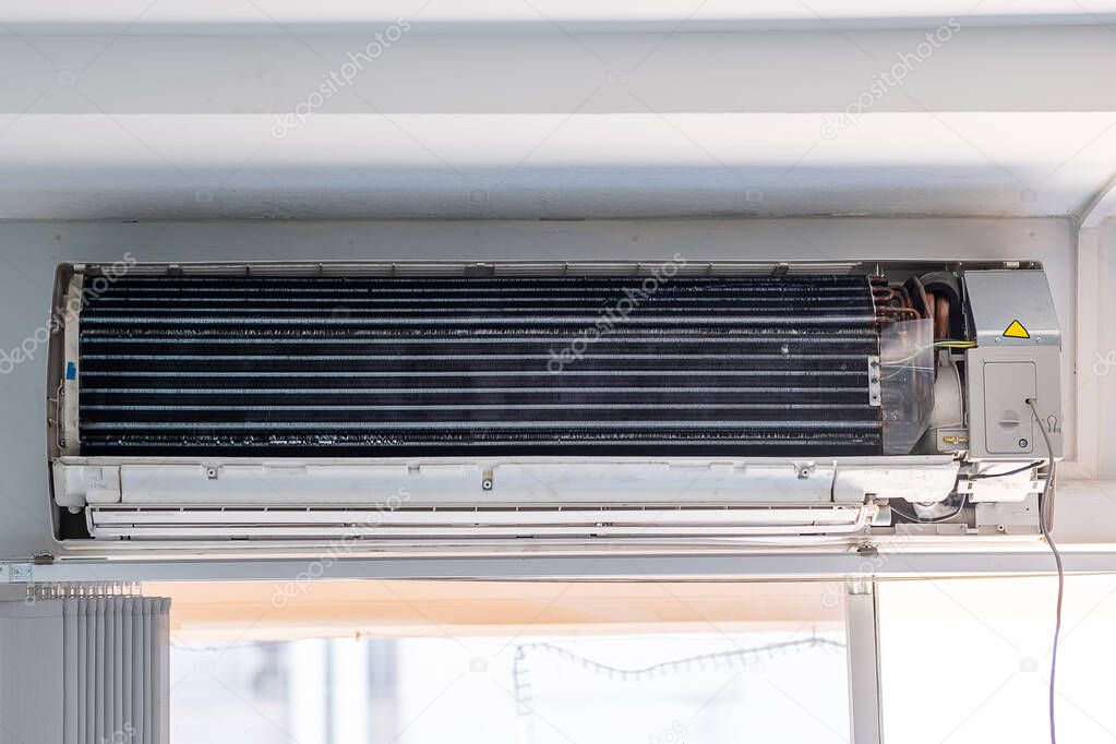 Air conditioner during Maintenance indoor. Cleaning, Washing and Conditioning Service concept