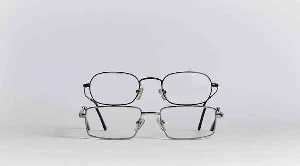 Two Pairs Glasses Fighting Themselves Bottom Pair Enemy Glasses Close — Stock Photo, Image