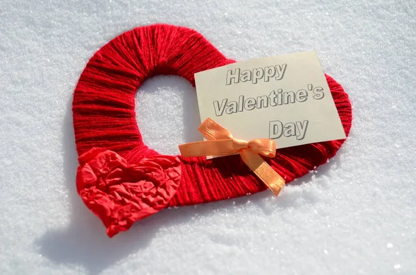 Happy Valentine's Day red hearts close up on snow — Stock Photo, Image