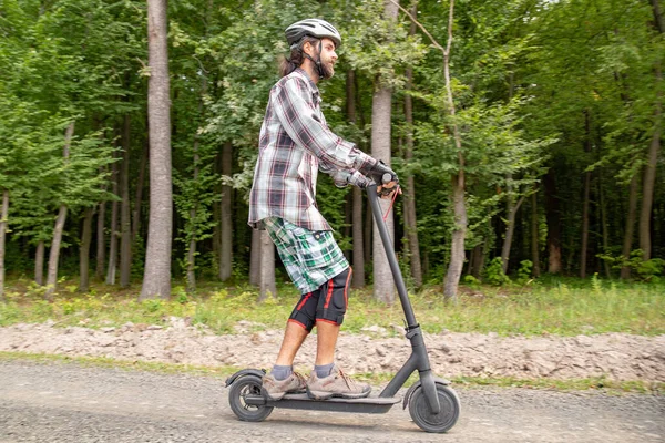 Soft Focus Bearded Man Riding Electrical Scooter Natural Reserve — Stock Photo, Image