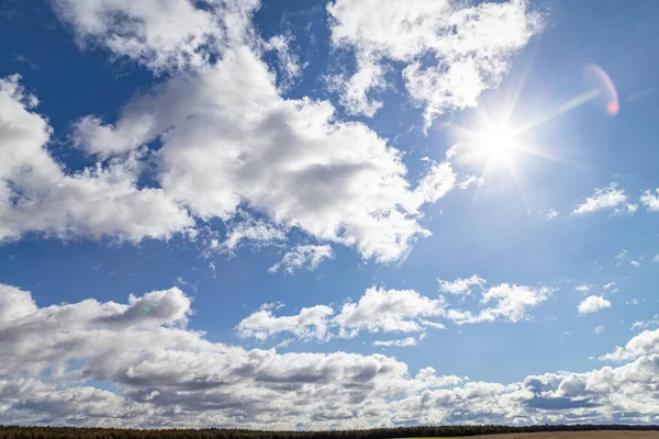 Sunny day sky landscape with clouds