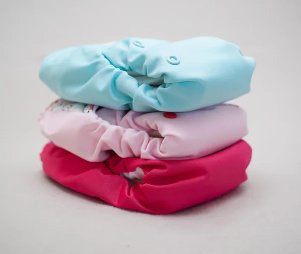 Stack of cloth diapers different colors — Stock Photo, Image