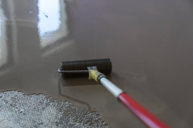 Ayna pürüzsüz yüzey zemin. Silindir uygulama. Kat co