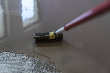 Ayna pürüzsüz yüzey zemin. Silindir uygulama. Kat co