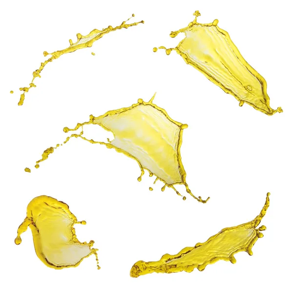 Элегантная коллекция изолированных брызг летящего масла на белом — стоковое фото