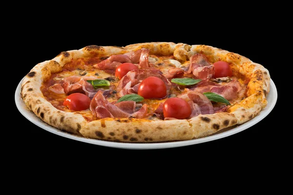 Pizza with cherry tomatoes, basil and prosciutto isolated on bla — Stock Photo, Image