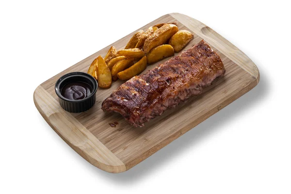 Delicious pork ribs with sauce — Stock Photo, Image