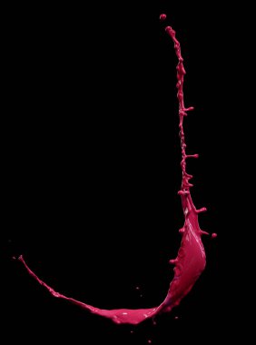 Güzel kırmızı boya siyah arkaplanda izole edilmiş. 
