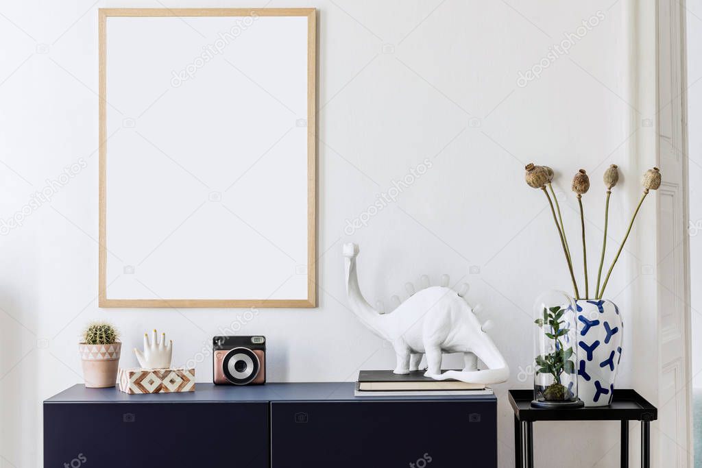 Modern interior design with gold mock up poster frame and elegant accessories on the shelf. Stylish living room and design home staging. Minimalistic concept of home decor. 
