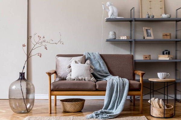 Modern apartment interior with stylish sofa and vase