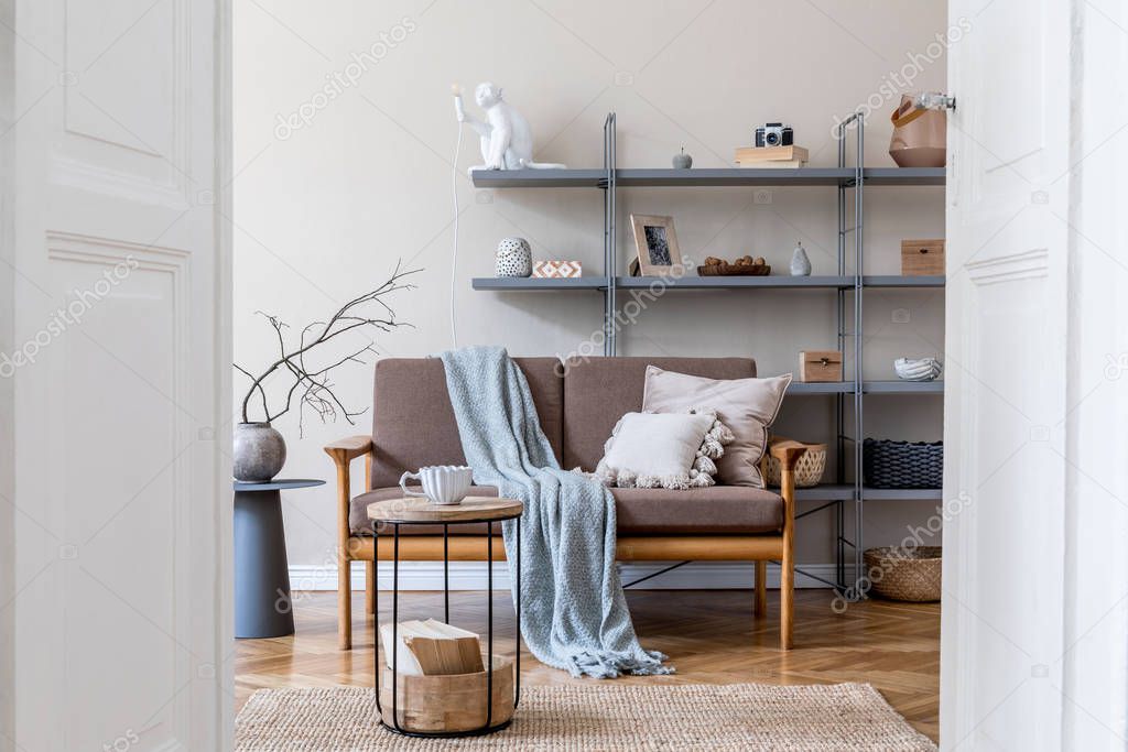 Modern apartment interior with stylish sofa and vase