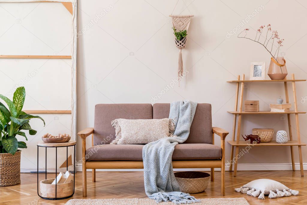 Contemporary design of apartment interior with stylish sofa