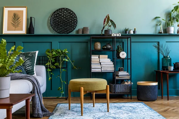 Green living room with cozy interior design