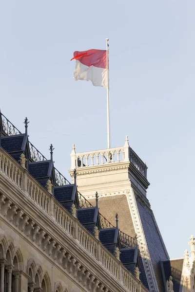 The austrian flag on tower of Wiener Rathaus Vienna City Hall, Austria